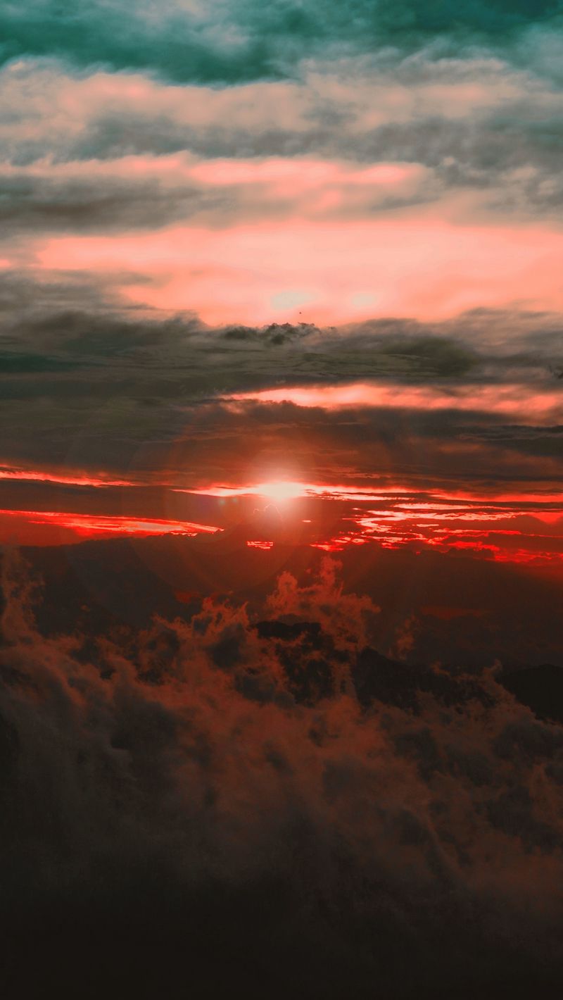 Download Wallpaper 800x1420 Clouds Sunset Sky Porous Dark Light
