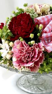 Preview wallpaper cloves, flowers, composition, vase, ribbon, decoration