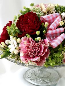 Preview wallpaper cloves, flowers, composition, vase, ribbon, decoration