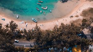 Preview wallpaper coast, aerial view, beach, road, buildings, trees