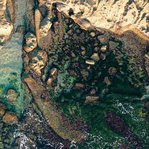 Preview wallpaper coast, aerial view, rocks, stones, sea