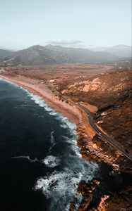 Preview wallpaper coast, aerial view, sea, landscape, hilly, road