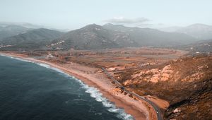 Preview wallpaper coast, aerial view, sea, landscape, hilly, road