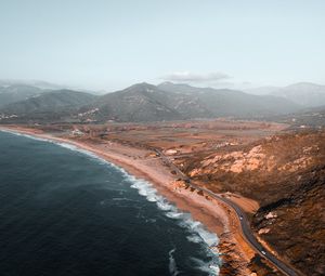 Preview wallpaper coast, aerial view, sea, landscape, hilly, road