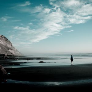 Preview wallpaper coast, beach, sand, loneliness, gloomy, silhouette