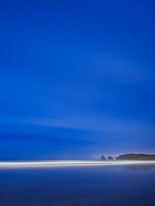 Preview wallpaper coast, beach, shallow, horizon, evening, blue