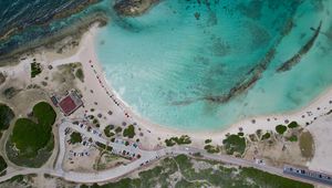 Preview wallpaper coast, buildings, island, sea, aerial view