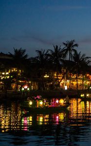 Preview wallpaper coast, buildings, lights, water, boats, dark