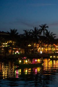 Preview wallpaper coast, buildings, lights, water, boats, dark