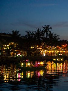 Preview wallpaper coast, buildings, lights, water, boats, dark