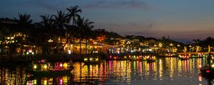 Preview wallpaper coast, buildings, lights, water, boats, dark