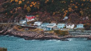 Preview wallpaper coast, buildings, rock, cliff, slope