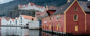 Preview wallpaper coast, buildings, rocks, water