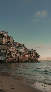 Preview wallpaper coast, buildings, sea, boats, beach