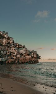 Preview wallpaper coast, buildings, sea, boats, beach