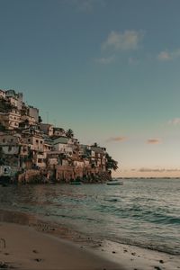 Preview wallpaper coast, buildings, sea, boats, beach