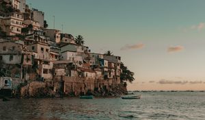 Preview wallpaper coast, buildings, sea, boats, beach