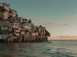 Preview wallpaper coast, buildings, sea, boats, beach