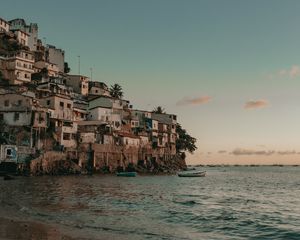 Preview wallpaper coast, buildings, sea, boats, beach