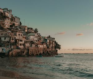 Preview wallpaper coast, buildings, sea, boats, beach