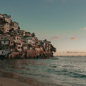 Preview wallpaper coast, buildings, sea, boats, beach