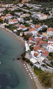 Preview wallpaper coast, buildings, sea, boats, aerial view