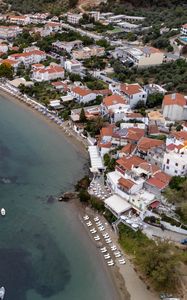 Preview wallpaper coast, buildings, sea, boats, aerial view