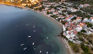 Preview wallpaper coast, buildings, sea, boats, aerial view