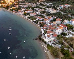 Preview wallpaper coast, buildings, sea, boats, aerial view