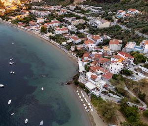 Preview wallpaper coast, buildings, sea, boats, aerial view