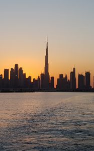 Preview wallpaper coast, buildings, sunset, city, dubai, uae