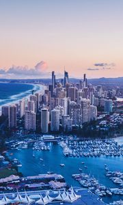 Preview wallpaper coast, city, buildings, evening