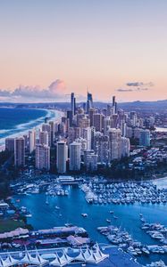 Preview wallpaper coast, city, buildings, evening