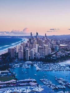 Preview wallpaper coast, city, buildings, evening