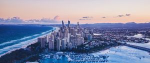 Preview wallpaper coast, city, buildings, evening
