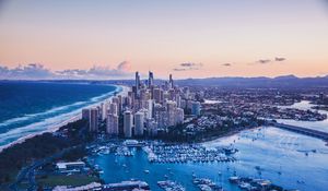 Preview wallpaper coast, city, buildings, evening