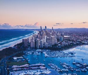 Preview wallpaper coast, city, buildings, evening