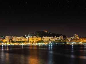 Preview wallpaper coast, city, night, lights, dark, reflection