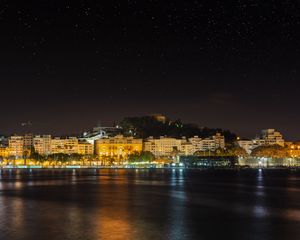 Preview wallpaper coast, city, night, lights, dark, reflection