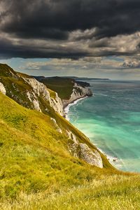 Preview wallpaper coast, cliff, rocks, sea, grass