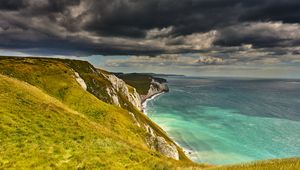 Preview wallpaper coast, cliff, rocks, sea, grass