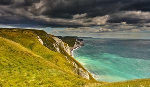 Preview wallpaper coast, cliff, rocks, sea, grass