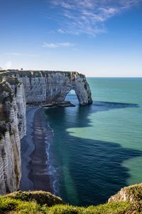 Preview wallpaper coast, cliff, rocks, sea, summer, landscape