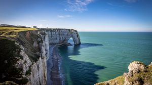 Preview wallpaper coast, cliff, rocks, sea, summer, landscape