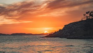 Preview wallpaper coast, cliffs, sunset, mountains, sea