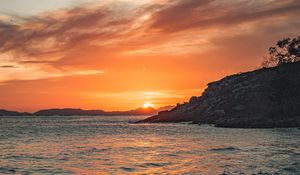 Preview wallpaper coast, cliffs, sunset, mountains, sea