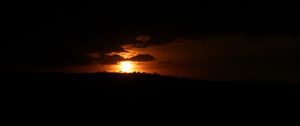 Preview wallpaper coast, clouds, sea, sunset, dark
