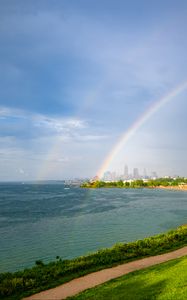 Preview wallpaper coast, field, water, rainbow, landscape