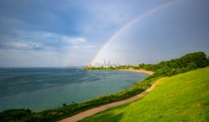 Preview wallpaper coast, field, water, rainbow, landscape