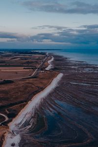 Preview wallpaper coast, horizon, road, sea, field